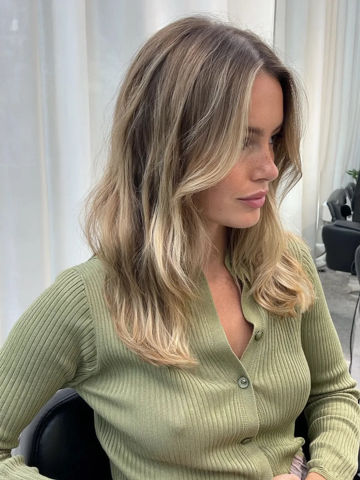 Long Layered Cut with Sandy Blonde Balayage